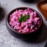 Beet hirring mayonnaise salad vinaigrette in a bowl. toning