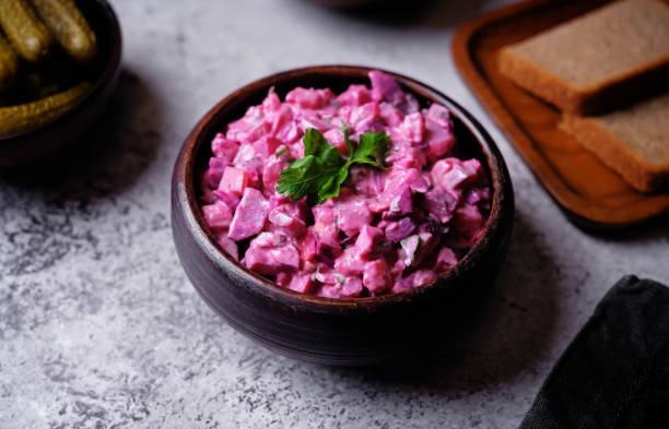 Beet hirring mayonnaise salad vinaigrette in a bowl. toning